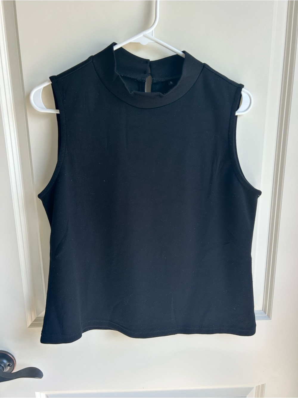 Black Sleeveless Mock Neck Too